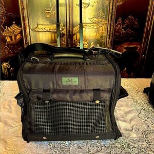 Eddie Bauer black expandable handle, rolling small pet carrier. ￼